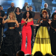 (L-R) Erica Campbell of Mary Mary, Tracee Ellis Ross, Tina Campbell of Mary Mary, and CeCe Winans speak onstage during the 2018 American Music Awards at Microsoft Theater on October 9, 2018 in Los Angeles, California.